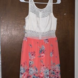 a white lace top and a floral bottom